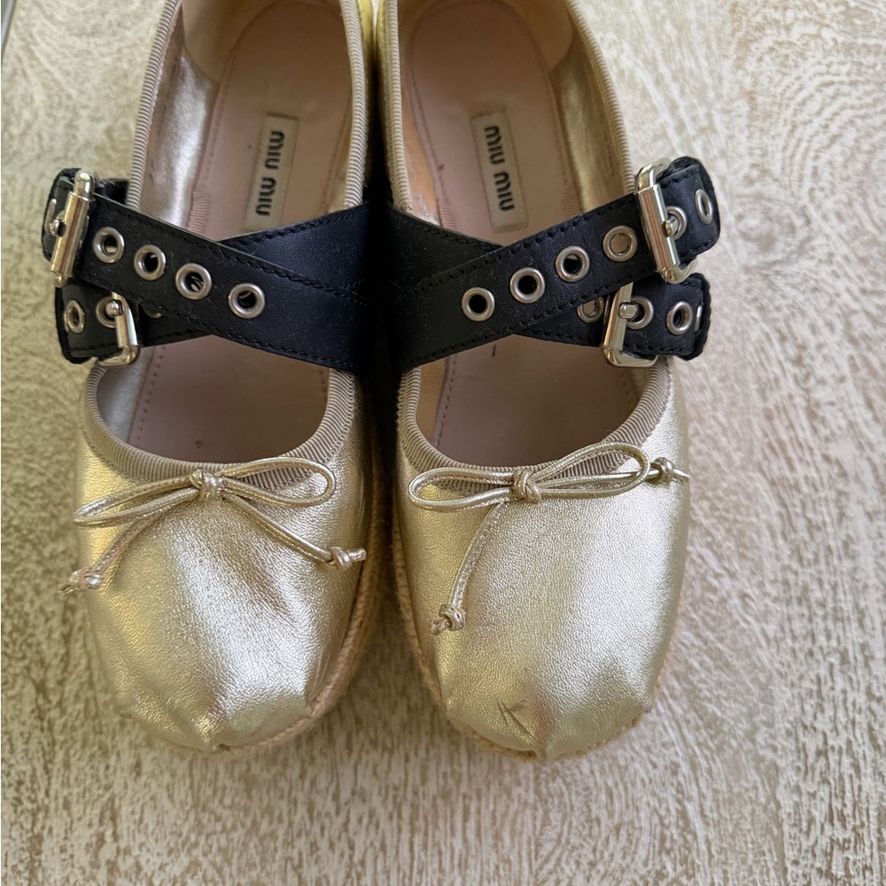 Miu Miu Metallic Gold Ballet Flats with Black Grommet Straps